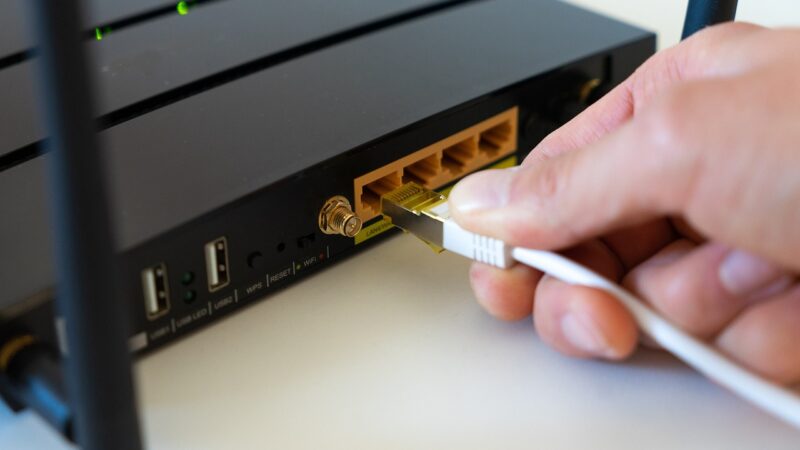 Router and Ethernet cable representing Auto MDI-X